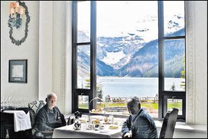 S. Amjad Hussain, right, with friend Hidayat Ullah at Lake Louise.