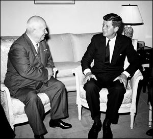 Soviet Premier Nikita Khrushchev and President John F. Kennedy talk in the residence of the U.S. Ambassador in a suburb of Vienna. The meeting was part of  a series of talks during their summit meetings in Vienna. 