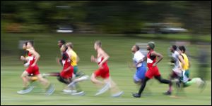 The start of the City League boys cross country race Saturday at Collins Park Golf Course.