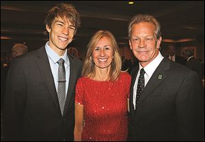 Carson, Barb and Randy Oostra at the Grand Illusions dinner for Ohio Cancer Research at the Grand Plaza Hotel.