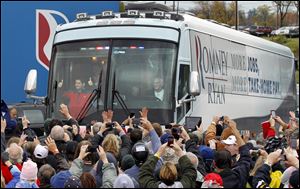 Republican vice presidential candidate, Rep. Paul Ryan, R-Wis., gives a thumbs-up to supporters as he arrives for a campaign rally Saturday at the Valley View Campgrounds in Belmont, Ohio.