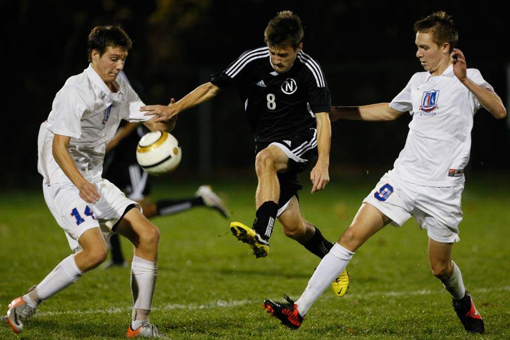 District-boys-soccer-double-team