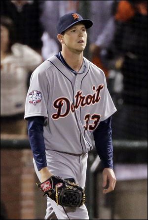 Detroit Tigers' Drew Smyly reacts after giving up a hit during the seventh inning of Game 2 of baseball's World Series against the San Francisco Giants on Thursday, in San Francisco.