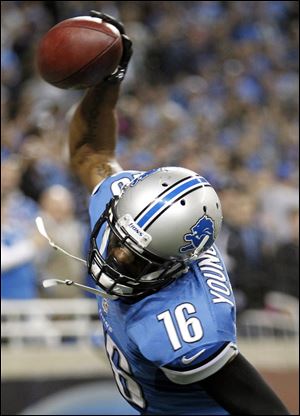 Detroit Lions wide receiver Titus Young spikes the ball after scoring the game-winning touchdown with 20 seconds left against the Seattle Seahawks on Sunday in Detroit. The Lions won 28-24.