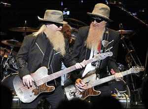 Dusty Hill, left, Frank Beard, on drums, and Billy F Gibbons performed Thursday at the Stranahan Theater.