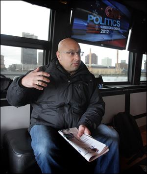 CNN's Ali Velshi on the CNN Election Express bus 2012.  The CNN Election Express bus is traveling to 4 swing states to interview voters, including Toledo, where it was parked Friday along the Maumee River in International Park.