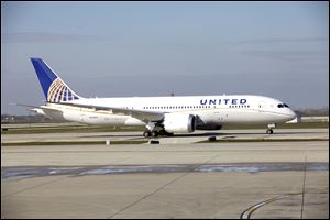 A United Airlines 787 Dreamliner arrives at O'Hare international Airport in Chicago, Sunday, from Houston, after making United's inaugural 787 revenue flight.