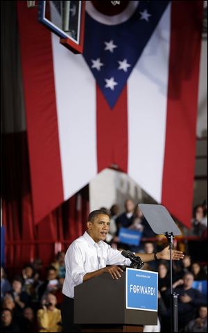 President Barack Obama speaks to supporters during a campaign event Saturday at Mentor High School in Mentor, Ohio.