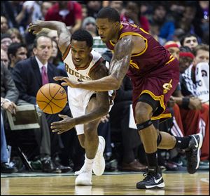 Cleveland Cavaliers' Alonzo Gee makes a steal from Milwaukee Bucks Brandon Jennings Saturday night.