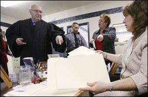 West Hanover Township Magistrate Roy Bridges, Office Manager Sandy Mader, center, and Clerk Shirley Ritrievi saw the same prostitutes in their court again and again