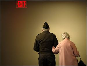 A couple makes their way to the exit after attending the eighth annual Veterans Appreciation Breakfast at the University of Toledo.