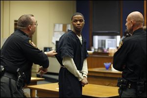 Reynard Lewis appears  in Lucas County Common Pleas Court for the murders of Darnell Townsend-Tall and Raynail Gaiter. He faces life in prison.