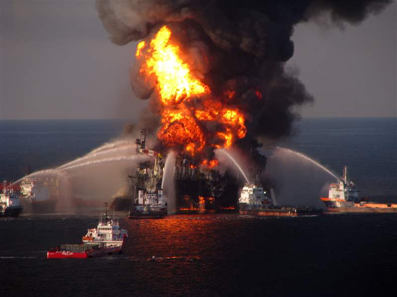 The-U-S-Coast-Guard-fire-boat-response-crews-battle-the-blazing-remnants-of-the-off-shore-oil-rig