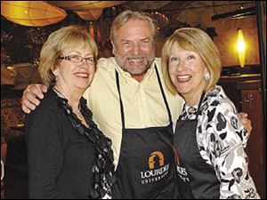 Janet Robinson, Richard LaValley and Mary Arquette are pleased with the success at Lourdes University Celebrity Wait Night.