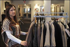 Lauren Deis  of Sophie's Sister clothing store in downtown Toledo says small-business owner know their customers can go elsewhere, so they work to offer unusual, high-quality goods and services.