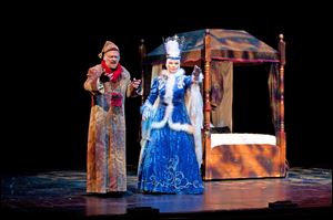 Paul Causman, left, is Ebenezer Scrooge and Barbara Barkan is the Ghost of Christmas Past in the Rep's 'A Christmas Carol.'