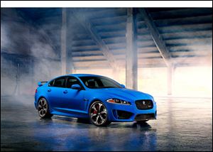 ﻿The 2014 Jaguar XFR-S sedan sports a 550-horsepower supercharged V-8 engine that avoids a gas-guzzler tax by getting 23 mpg on the highway. The car starts at $99,000 and goes on sale this summer.