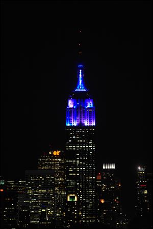 The top floors of New Yorks Empire State Building are lit in blue and white light after being switched on by R&B star Alicia Keys. The landmark boasts a new LED lighting system with a palette of more than 16 million colors in limitless combinations, including ripples, sparkles, chasers, sweeps, strobes and bursts.