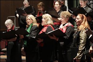 Members of the Lourdes University Chorus sing. From left, front row: Barbara Manny of Toledo; Tena Ernst of Sylvania; Wanda Anderson of Toledo; Sandi Hawk of Toledo; and Jill Hojnacki of Wauseon.