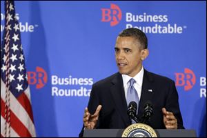 President Obama gestures as he speaks about the fiscal cliff at the Business Roundtable, an association of chief executive officers, in Washington, today.