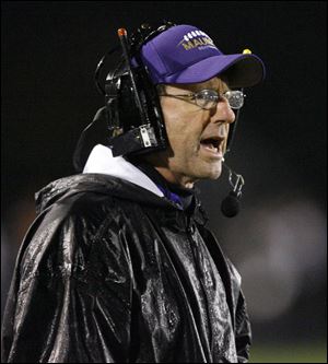 Maumee high school head coach John Boles yells to his team during the second quarter against Sylvania Southview in 2008.