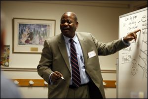 Dr. Alphonsus Obayuwana shares his 30-year study of human hope and its importance in well-being during a lecture at Way Public Library on his book, ‘The Five Sources of Human Hope.’ He was struck in the late 1970s by how paralytic depression can be for patients.