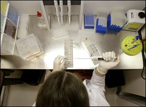 Irina Barsky works on fertility treatments at the Reproductive Genetics Institute, which is led by Yury Verlinsky, in Chicago.