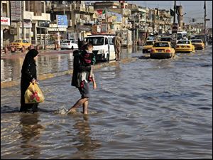 Officials: Houses collapse in heavy rain in Iraq, - Toledo Blade