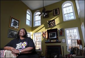 Deatrice S. Besong's mortgage servicer reduced her debt $249,000 saving $300 a month and erasing the debt overhang on her Upper Marlboro, Md., home. The action was prompted by the national mortgage settlement. But the road wasn't smooth, as many homeowners are finding out.