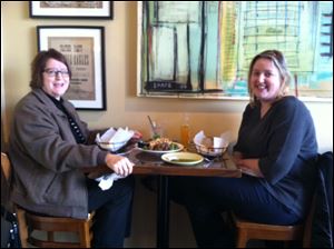 Mary Wabeke, left, of Sylvania, and Karen Wabeke, of Baltimore, Md., share a meal at Zingo's in Perrysburg.