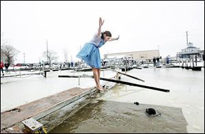 A participant prepares to plunge into the River Raisin during the 2012 event, which had 78 plungers. The Monroe County Special Olympics will be among the beneficiaries of the event.