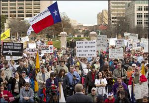 Hundreds attend a Guns Across America pro-Second Amendment rally today at the state Capitol in Austin, Texas.