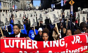 Participants march today down Fayetteville Street in Raleigh, N.C., during the 33rd annual Dr. Martin Luther King Jr. parade. 