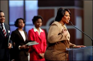 Bernice King, daughter ofMartin Luther King Jr., right, speaks during the annual Martin Luther King Jr. holiday commemorative service at the Ebenezer Baptist Church, in Atlanta.