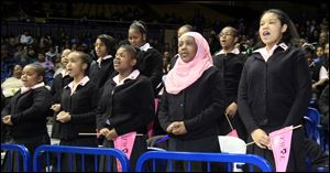 Students from Ella P. Stewart Academy recite their pledge during the Martin Luther King, Jr. Unity Celebration at the University of Toledo. The students, all sixth graders, are, from left: Jayona Wren, Taylor Hughes, Najae Pettaway, Imani Hicks, and Jayla Edwards. 