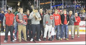 The Central Catholic High School football team was honored with an on-ice ceremony before the start of the Walleye game. The team showed off its state title trophy and dropped the ceremonial first puck.