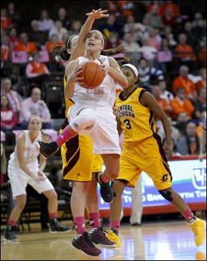 BG's Jillian Halfhill, who had 14 points, is fouled by Central Michigan's Jessica Schroll. The Falcons are 14-7, 5-3 in the MAC.