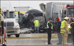 Emergency personnel from multiple departments on the scene of a multi-vehicle crash on U.S. 24 near Paulding County Road 87 near Cecil, Ohio.