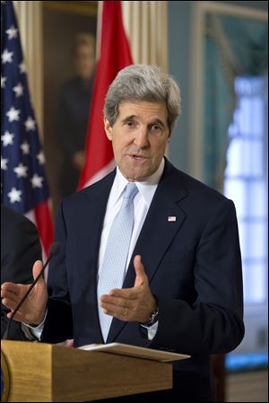 Secretary of State John Kerry speaks to reporters at the State Department in Washington, Friday, Feb. 8, 2013, after a bilateral meeting with Canadian Foreign Minister John Baird. Beyond U.S. Canada relations and the Keystone XL pipeline project, Kerry warned Iran to come to upcoming nuclear talks prepared to talk seriously with world powers about addressing concerns over its nuclear program.  (AP Photo/J. Scott Applewhite)