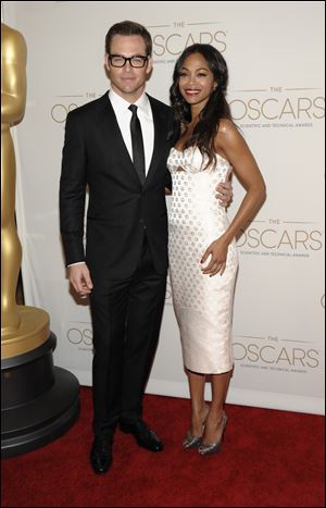 Actor Chris Pine, left, and actress Zoe Saldana arrive at The Academy of Motion Picture Arts and Sciences, Scientific and Technical Awards at The Beverly Hills Hotel in Beverly Hills, Calif. The pair are stars in the recent reboot of the 'Star Trek' franchise.