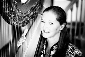  Harpist Julie Buzzelli will be the featured soloist in Harp Madness, Friday at 7 p.m. in Trinity Episcopal Church, 316 Adams St.