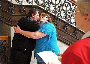 Robert Davis and Mary Ann Valentine Davis, wed by the Rev. Sandra Frost at the courthouse, are among 43 couples who applied for marriage licenses there on Valentine’s Day. The Davises are from Taylor, Mich.