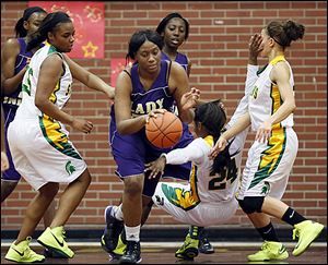 Waite's Latesha Craig knocks over Start's Torie McDuffie. Craig scored 12 points. The Indians will face Rogers in the final.