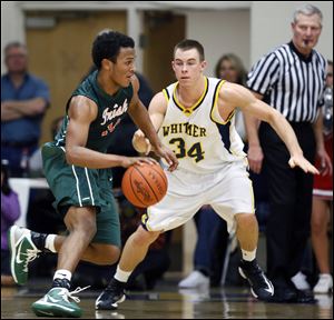 Central Catholic's DeShone Kizer (14) drives  against Whitmer's Nate Holley (34).