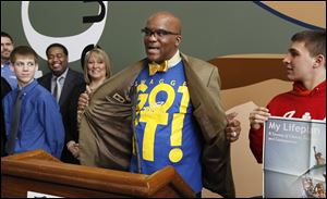 John Henry Livingston displays his ‘Swagger Got It’ shirt as he talks about the Leadership with Swagger initiative during a news conference at the University of Toledo on Wednesday. 