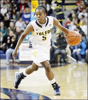 The University of Toledo's Janelle Reed-Lewis has averaged four points in 14 minutes per game for the Rockets this season. She and her brother have been roommates since the start of school last fall.