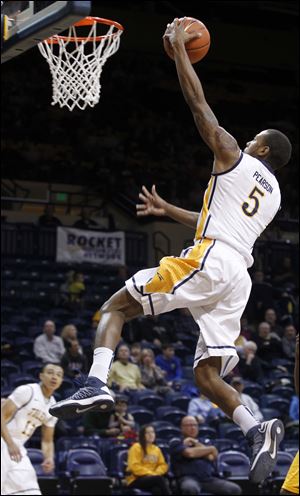 Toledo's Rian Pearson soars for two points.