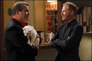 Eric Stonestreet, left, and Jesse Tyler Ferguson in a scene from the ABC hit show 