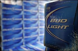 Beer lovers across the country have filed $5 million class-action lawsuits accusing Anheuser-Busch of watering down its Budweiser, Michelob and other brands.