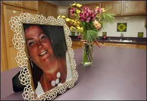 A picture of the late Kim Mardini-Channer, who died from colon cancer, graces the counter at the newly renovated kitchen for Nightingales Harvest at St. James Lutheran Church.